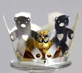 Macro shot of silver laser-cut bear cupcake wrappers with heart detail for parties - Reflective Silver