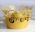 Golden laser cut cupcake wrappers with elegant scrollwork pattern for party decor - Gold