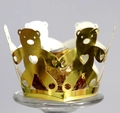 Detail of laser-cut golden bear cupcake wrapper with heart motif for chocolates - Reflective Gold