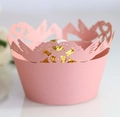 Detail of pink laser-cut lace cupcake wrapper with bird and heart patterns - 5cm / Pink