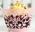 Close-up of pink lace laser-cut cupcake wrapper with intricate floral vine patterns - 5cm / Pink