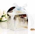 Detail of silver birdcage wedding favor box with laser-cut birds and blue ribbon - Reflective Silver