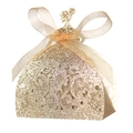 Macro detail of glitter gold hollow-out gown-shaped wedding favor gift box with ribbon - Glitter Rose Gold