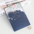 Intricate laser-cut navy wedding invitation with elegant floral patterns and a rose inner card - Phantom Blue
