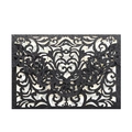 Close-up of laser-cut black glitter wedding invitation cover with intricate floral patterns - Glitter Black