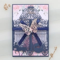 Intricate laser-cut pumpkin carriage wedding invitation with navy ribbon and butterfly - Magic Blue