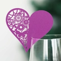 Detail of purple laser-cut heart place card with floral hollow pattern on wine glass - Dark Purple