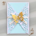 Laser cut blue invitation with white lace sleeve and 3D golden butterfly decoration - White Cover And Light Blue Inner Page
