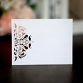 Elegant laser-cut lace pearl white place card on dark wood for wedding invitations - White