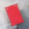 Red hollow-out lace laser-cut wedding card with intricate floral border on mesh background - Pearlescent Red
