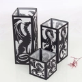 Set di tre lanterne di carta a forma di drago nero con intagli decorativi di diverse altezze - Paralume Drago Taglie Miste
