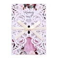 Elegant ivory laser-cut lace wedding invitation set with floral inner card and silk ribbon - White