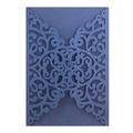 Detail of navy blue laser-cut wedding invitation with elegant pearlescent floral patterns - Magic Blue