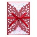 Detail of burgundy laser-cut invitation card with red ribbon bow and floral inner page - Dark Red