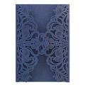 Close-up of laser-cut lace pattern on navy blue glitter paper wedding invitation - Ink Blue