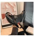 Black crescent moon shoulder bag with silver chain detail and punk style strap - Black