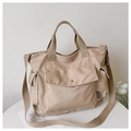 Sac fourre-tout en toile kaki avec poche avant et bandoulière réglable, style moderne - Kaki
