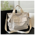 Grand sac fourre-tout en toile beige avec plusieurs poches et bandoulière réglable - Blanc Cassé