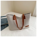 Detail of off-white canvas tote with brown leather handles and FASHION embossed label - Brown