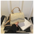 Elegant beige straw crossbody bag with floral embroidery and a stylish knotted handle - Khaki