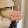 Pink quilted crossbody bag with gold twist lock and elegant top handle for women - Pink