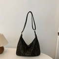 Minimalist black pleated hobo shoulder bag with cloud texture and zipper closure - Black