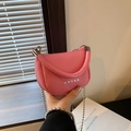 Pink litchi grain leather crossbody bag with silver star rivets and beaded chain - Pink