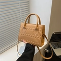 Structured khaki crossbody bag with diamond stitch pattern and round top handles - Khaki