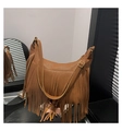 Detailed view of brown hobo bag featuring long tassels and premium lychee grain leather - Brown