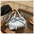 Light blue bucket bag with bow drawstring and adjustable shoulder strap for casual wear - Blue
