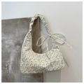 Bloemen canvas baguette tas met geplooide schouderband en paars strikje decoratie - Paars