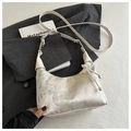 White hobo shoulder bag with floral bamboo print and elegant pearl tassel detail - White