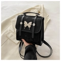 Bolso bandolera retro negro mate con adorno de mariposa de metal y diseño versátil - Negro