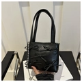 Chic black shoulder bag with bow details and silver bead chain accessory - Black