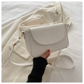 Elegant white rectangle crossbody bag with gold buckle on white fabric backdrop - White