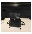 Fashionable black PU leather drawstring backpack with gold logo lettering on the flap - Black