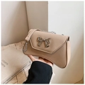 Elegante borsa a tracolla beige con fiocco argentato e spallina a catena raffinata - Cachi