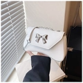 White minimalist crossbody bag with silver bow accent and adjustable chain strap - White