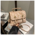 Beige marble pattern crossbody bag with golden buckles and artistic fluid textures - Patterned Pink