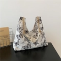 Sac fourre-tout en toile blanche avec motifs papillons noirs et bandoulière chaîne dorée - Noir