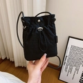 Minimalist black nylon drawstring crossbody bag for phone with fashion woven label - Black