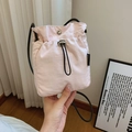 Minimalist light pink nylon drawstring bucket bag with black strap for women - Pink