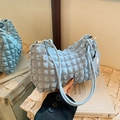 Stylish light blue bubble textured shoulder bag with floral pendant and ruched design - Blue