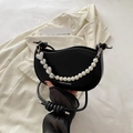 Black half-moon shoulder bag with large pearl and silver heart chain charm detail - Black