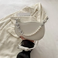White crescent moon shoulder bag featuring pearl strap and silver heart chain detail - White