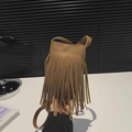Caramel brown leather crossbody bag featuring long bohemian tassels and thin strap - Brown