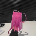 Fuchsia crossbody phone bag with long tassel detail and thin white shoulder strap - Rose Red