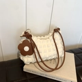 White bubble-textured shoulder bag with brown leather straps and flower charm - White and Brown