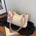 Chic cream bubble texture shoulder bag with pink leather strap and flower charm - White and Pink