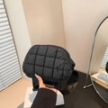 Chic black quilted crossbody bag with textured grid pattern and wide nylon strap - Black